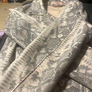 Snake skin tan,an black jacket